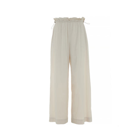 Off-white wide-leg pants with elasticated ruffle waistband and drawstring ties, lightweight popeline fabric.