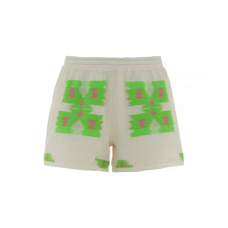 Beige jacquard shorts with bright green and fuchsia geometric patterns and elastic waistband.