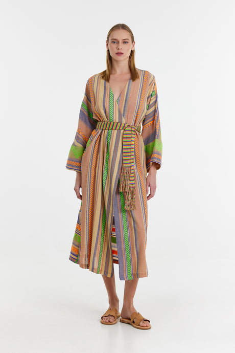 Long jacquard dress with multicolored vertical stripes, V-neck, and belted waist in green and orange tones.
