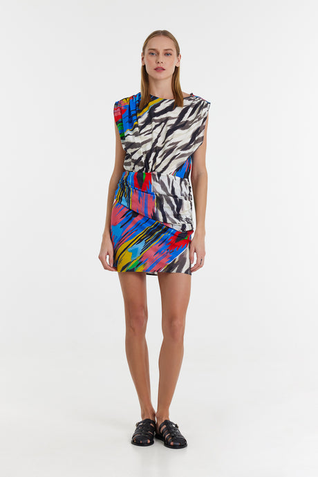 Sleeveless multicolor mini dress with bold abstract print and padded shoulders.