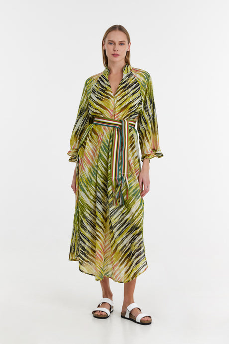 Long khaki wrap dress with palm leaf print, 3/4 sleeves, and a belted waist.