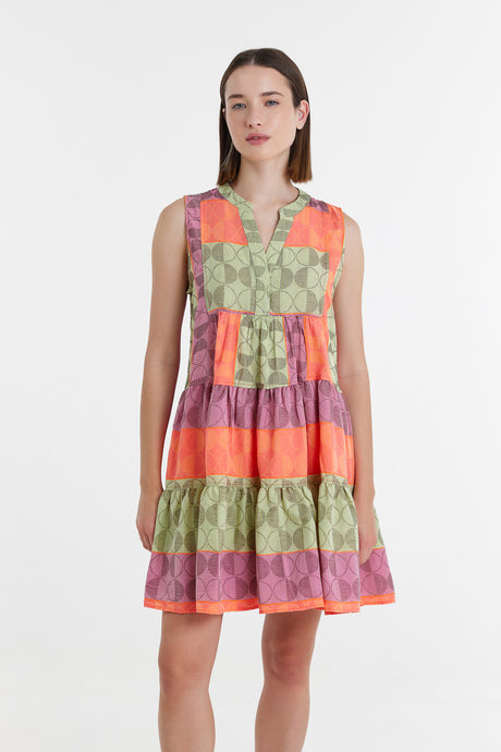 Sleeveless tiered mini dress with lime green, orange, and purple jacquard stripes and a V-neck collar.