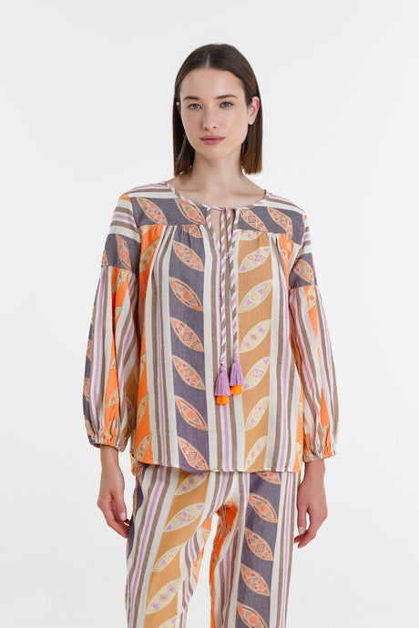 Orange and lilac blouse with vertical leaf print, balloon sleeves, and front tassel ties.