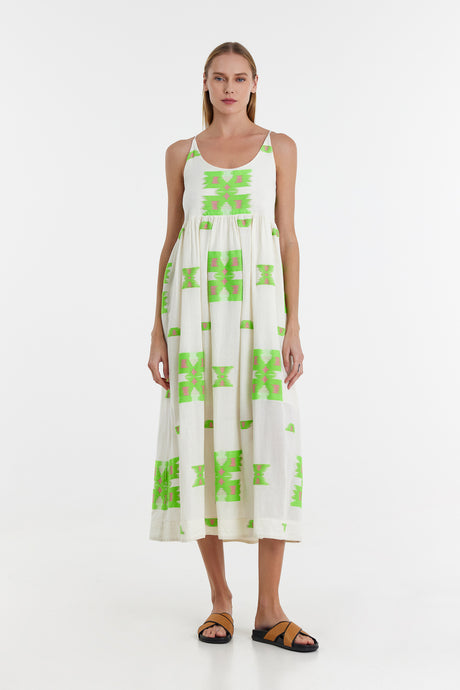 Sleeveless white jacquard midi dress with green geometric print and square neckline.