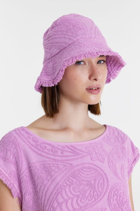 Lilac textured terry cloth bucket hat with a subtle paisley pattern.