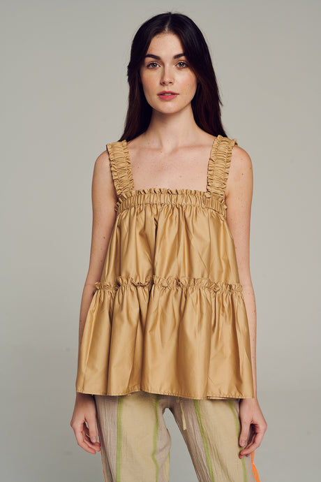 Beige sleeveless top with ruffled straps and tiered, loose-fitting bodice in lightweight fabric.