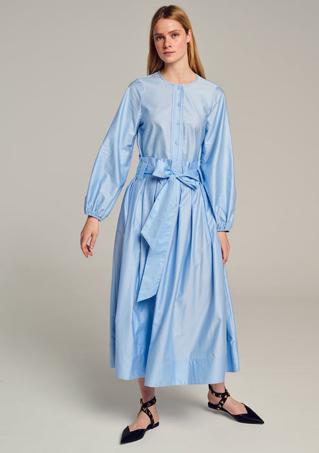 Light blue midi dress with long puffed sleeves and tied waist bow.