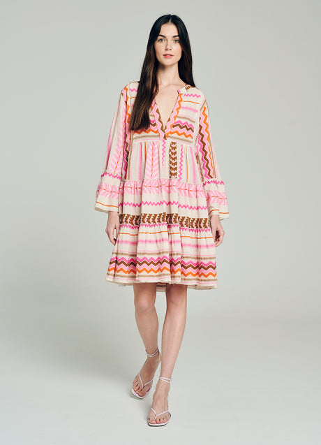 Pink jacquard short dress with tiered skirt and three-quarter sleeves, v-neckline with button details.