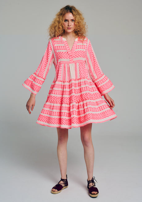 Pink and off-white jacquard short dress with flared bell sleeves and tiered skirt.