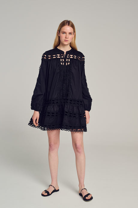 Black short popeline dress with long sleeves, lace inserts, and a loose fit.