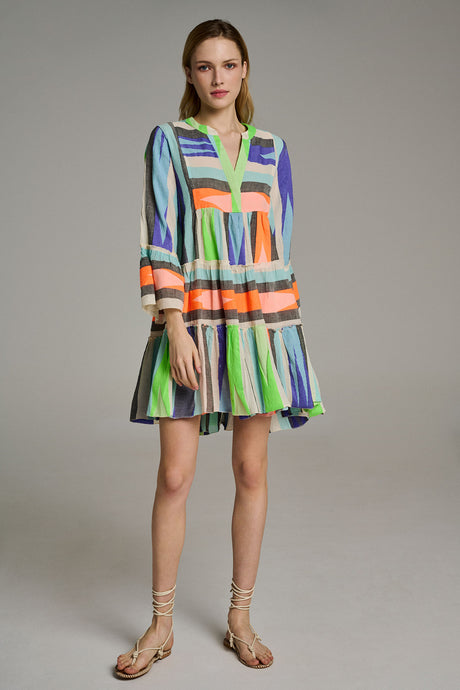 Multicolor jacquard short dress with long sleeves, ruffled tiered skirt, and vibrant blue, green, orange, and purple.
