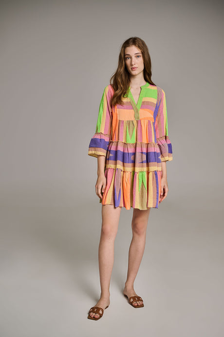 Short jacquard dress with beige, blue, orange, green, and purple vertical stripes, tiered skirt, and 3/4 sleeves.