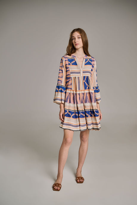 Short jacquard dress in blue and peach geometric pattern with tiered skirt and flared sleeves.