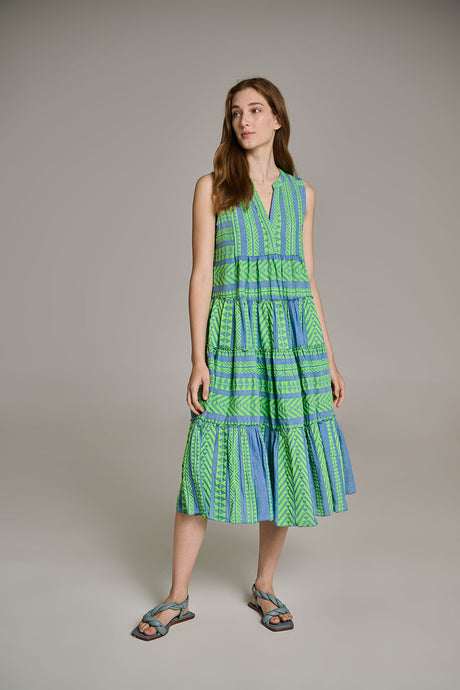 Sleeveless green and blue jacquard midi dress with tiered skirt and v-neckline.