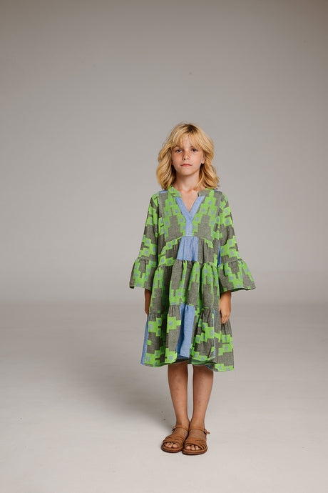 Green and blue patterned knee-length dress with tiered bell sleeves and V-neckline.